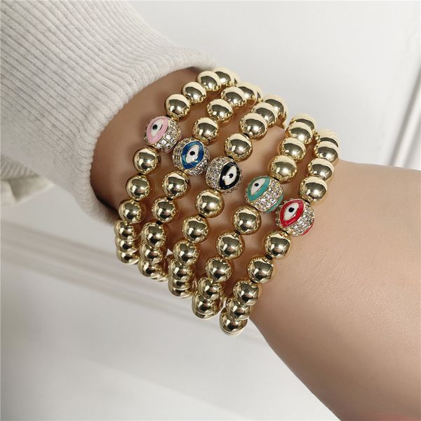 New stylish copper bead bracelets featuring micro pave evil eye charms