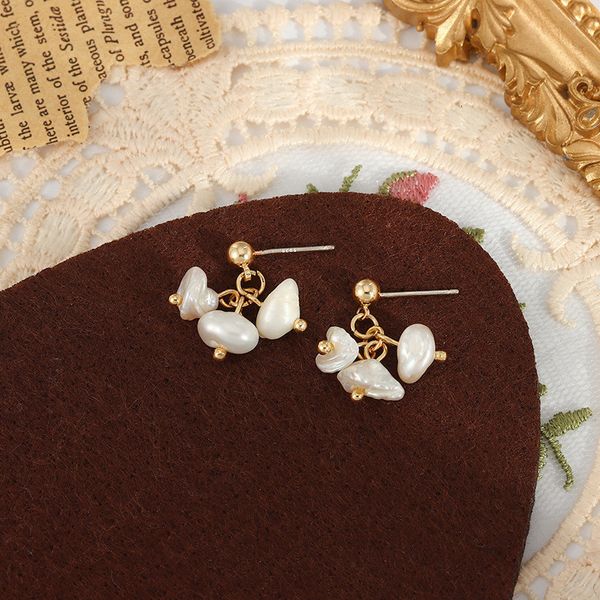 Pearl earrings with a French court Baroque fritillary design, featuring a simple petal pin clip for women