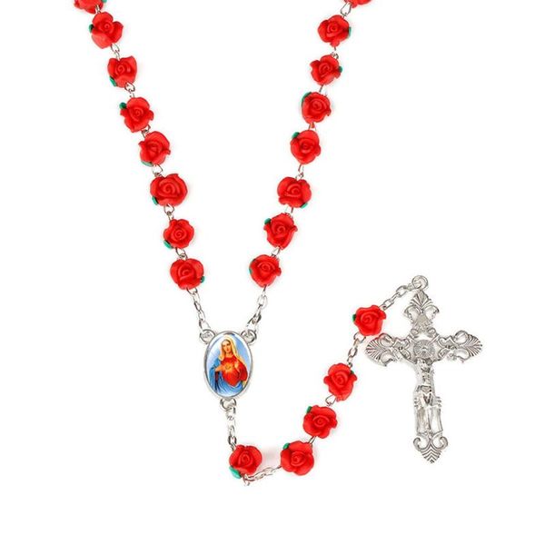 Pendant necklace featuring polymer clay rose beads and a Catholic rosary with holy soil medal and crucifix cross  

Religious cross necklace with rosary beads, polymer clay roses, and a sacred soil pendant  

Catholic rosary necklace adorned with clay rose beads, holy medal, and crucifix pendant  

Faith-inspired pendant necklace combining polymer clay roses, rosary beads, and religious cross  

Devotional necklace with polymer clay rose beads, Catholic rosary, and blessed soil crucifix pendant  

Sacramental necklace featuring clay rose beads, rosary chain, and holy cross with sacred soil medal  

Religious pendant necklace with polymer roses, Catholic rosary beads, and crucifix with blessed soil  

Pious necklace combining clay rose beads, rosary chain, and holy cross with sacred medal  

Catholic devotional necklace with polymer clay roses, rosary beads, and crucifix pendant  

Sacred pendant necklace featuring clay rose beads, rosary chain, and blessed soil cross medal