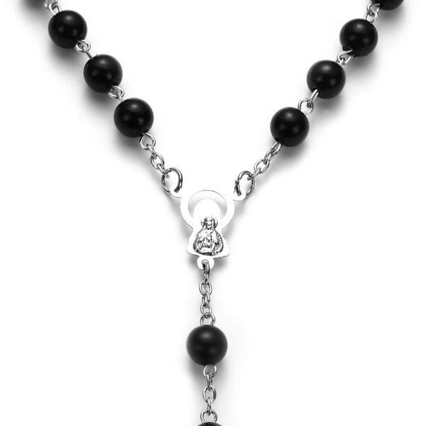 Pendant necklaces featuring crucifix charms, stylish rosary beads, and chains with Jesus and Virgin Mary crosses