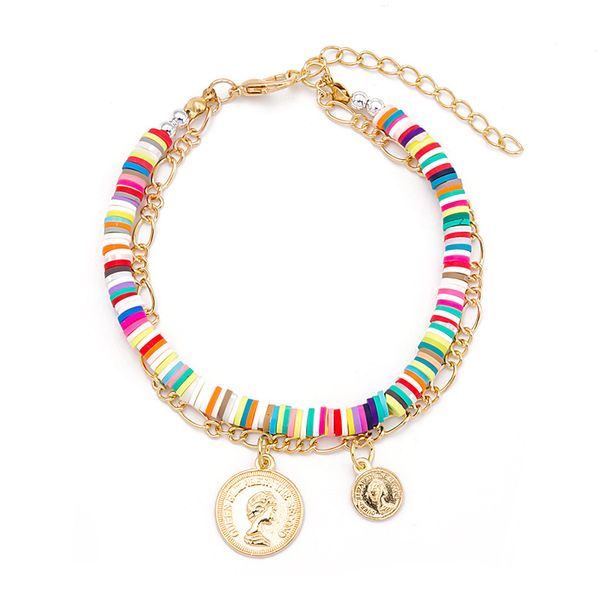 Polymer clay heishi beads with evil eye and pearl charms for a stylish summer beach bracelet