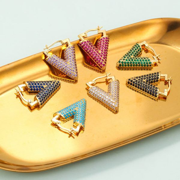Popular gold brass earrings featuring colorful zircon letter V charms, a stylish gift for women