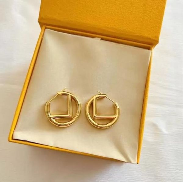 Premium gold diamond designer hoop earrings with luxury letter design and elegant jewelry box