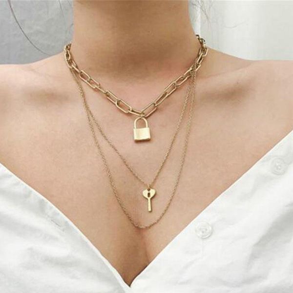 Punk-style layered pendant necklace featuring bold geometric chains and vintage lock-and-key charms for women