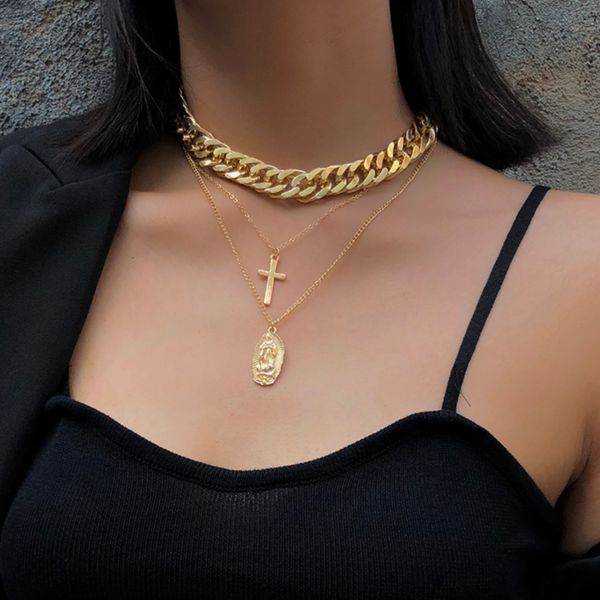 Punk-style multi-layered Cuban curb choker necklace featuring a bold Virgin Mary cross pendant for women