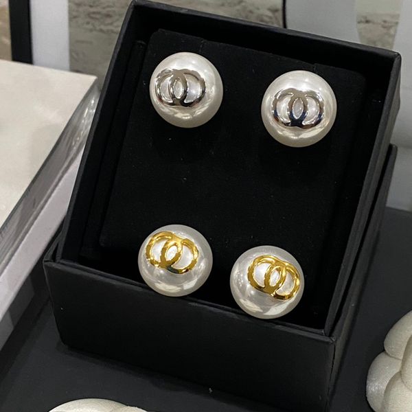 Round designer ear studs featuring high-quality pearls, real gold, brass, and copper stamp letters, perfect for elegant women's wedding and party jewelry