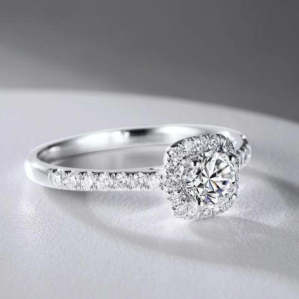 Round Designer ring featuring luxurious 100% moissanite in sterling silver, a stylish unisex choice for weddings, engagements, or gifts