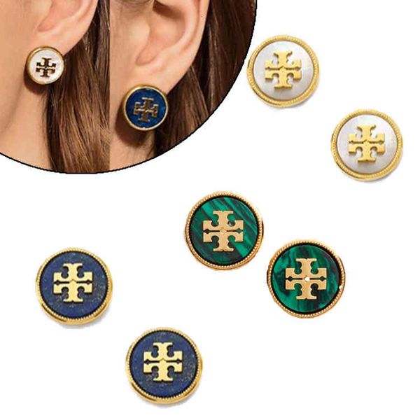 Round fashion accessories featuring inlaid shell, turquoise, and lapis lazuli in multicolor designs