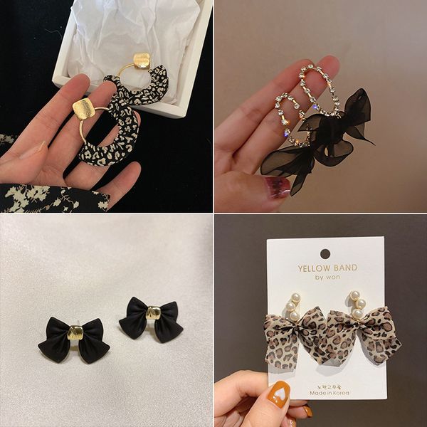 S925 silver bow-shaped earrings, stylish and elegant minimalist design, trendy Korean-inspired fashion accessory for women in autumn and winter