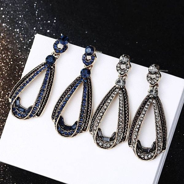 S925 silver needle earrings with diamond accents, stylish drop design for women