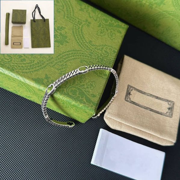 Silver-plated copper bangle bracelet with elegant classic design, perfect as a gift and comes in a high-quality jewelry box