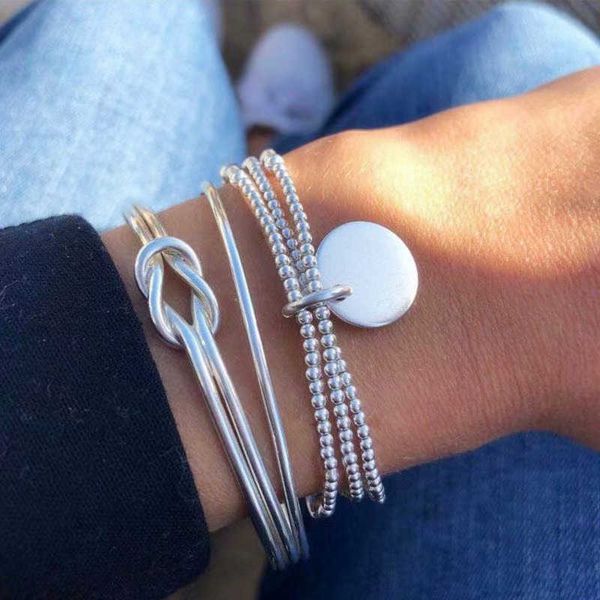 Silver-toned disc charm bead chain bracelets for women, a stylish geometric bangle set perfect for parties and costumes