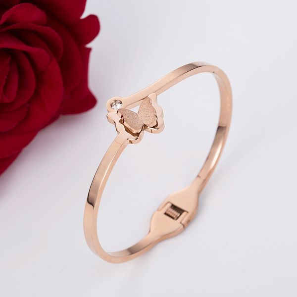 Simple Korean-style butterfly charm bangle in rose gold stainless steel