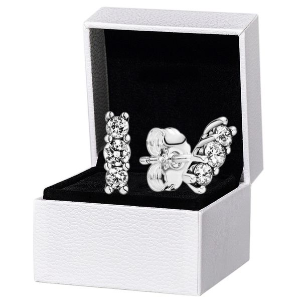 Sparkling three-stone stud earrings in genuine 925 sterling silver, elegant women's wedding and party jewelry featuring crystal accents for a luxurious touch