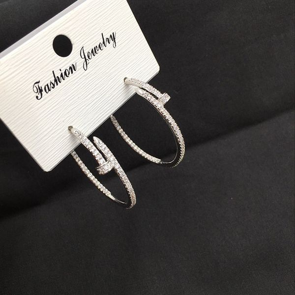 Sparkling zirconia copper screw hoop earrings with circular studs for women in S925 silver, a luxury designer fashion piece
