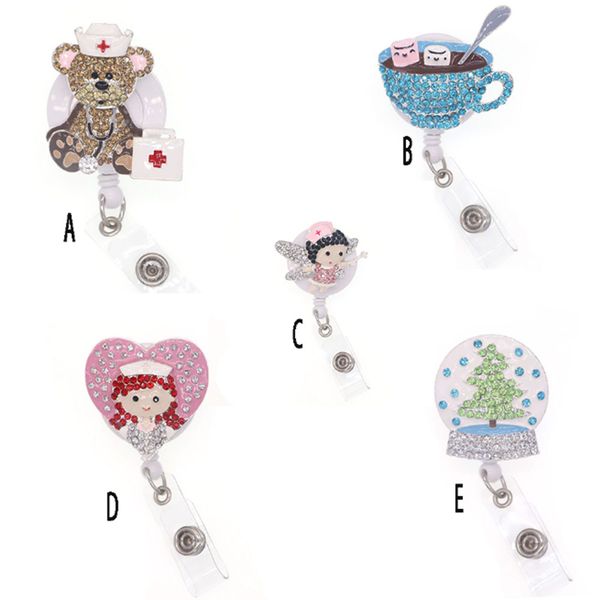 Sparkly rhinestone retractable badge reels with animal and symbol designs for medical professionals