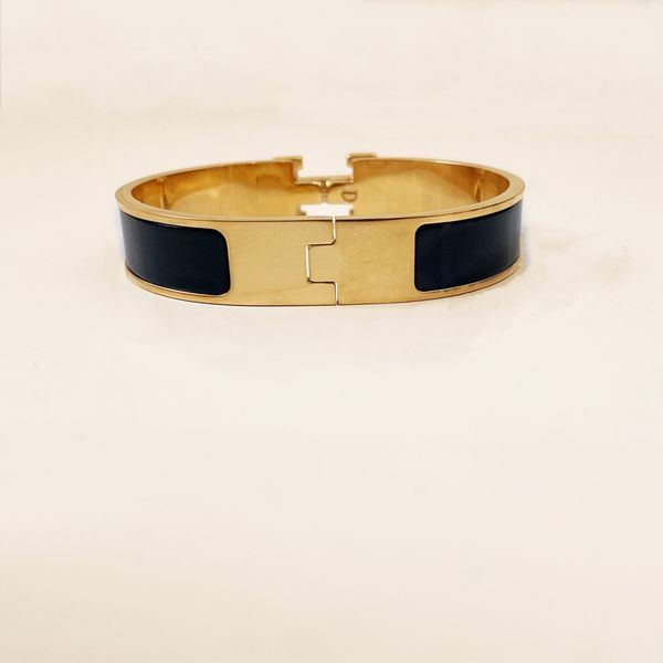 Stainless steel bangle bracelet with gold buckle, stylish unisex jewelry for men and women