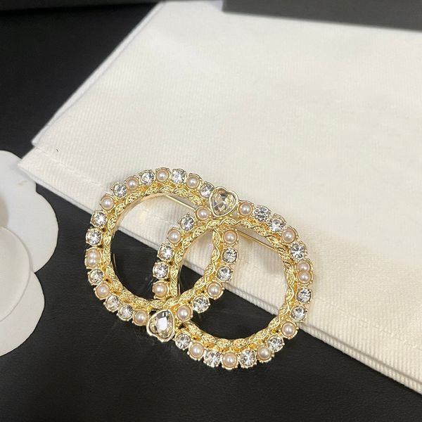 Stainless steel designer brooches featuring crystal bee motifs with pearl accents, perfect for women's wedding attire and party outfits