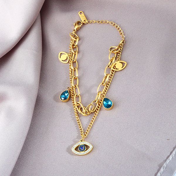 Stainless steel evil eye charm bracelet with double-layered gemstones, perfect for gifting