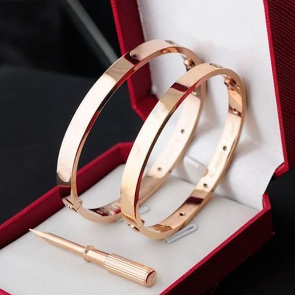Stainless steel Love Bracelets in silver and rose gold for couples, a stylish unisex bangle jewelry set with a gift bag