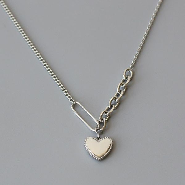 Stainless steel pendant necklace featuring a beaded heart design for women, available in polished silver for a clavicle chain style