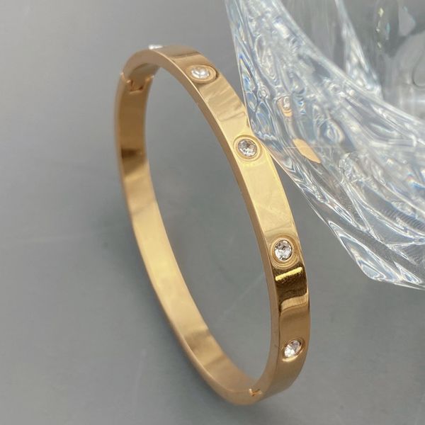 Stainless steel women's bracelet with 18K gold plating, a stylish high-quality bangle jewelry accessory