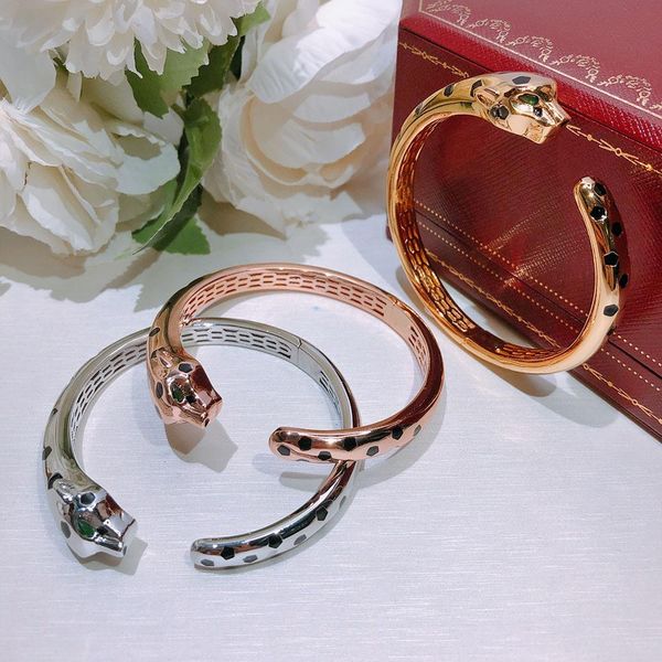 Street-style gold bangle featuring bold black leopard print, a luxurious gift for lovers and parties