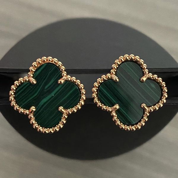 Stud earrings featuring vintage four-leaf clover charm with mother-of-pearl back in stainless steel gold and agate, perfect for women's wedding jewelry
