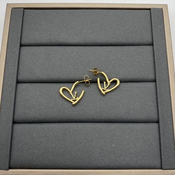 Stylish designer gold stud earrings for men and women, paired with premium Valenti necklaces for elevated looks