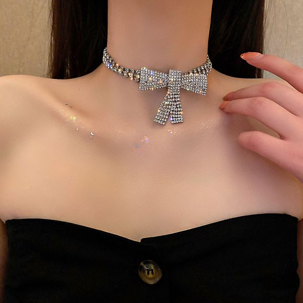 Stylish diamond bow pendant necklace with red net choker design for clavicle adornment