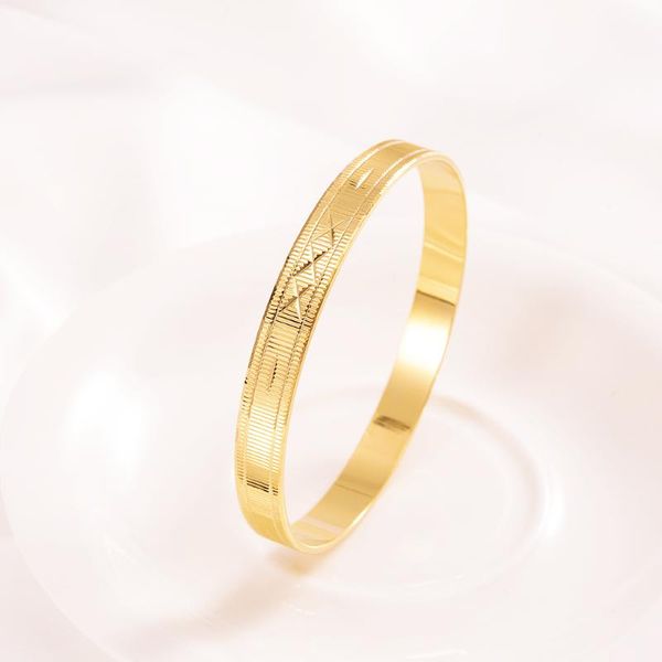 Stylish gold charm bangles for women and men, perfect as party or birthday gifts