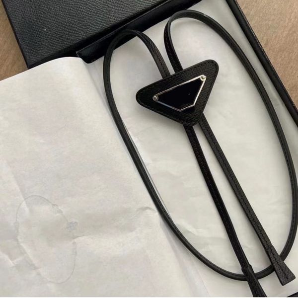 Stylish leather bow tie necklaces with inverted triangle pendants for men and women in black, white, brown, and red