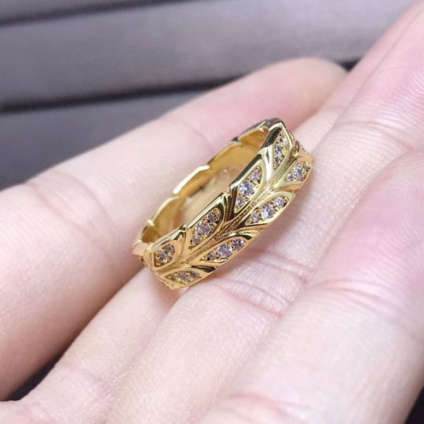 Stylish titanium and steel rings with engraved T letter, diamond accents, and 18K gold plating in three colors for men and women, available in US sizes