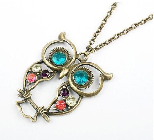 Stylish vintage-inspired owl pendant necklace with floral carvings, long sweater chain for women, factory-priced Christmas gift set of 60 pieces