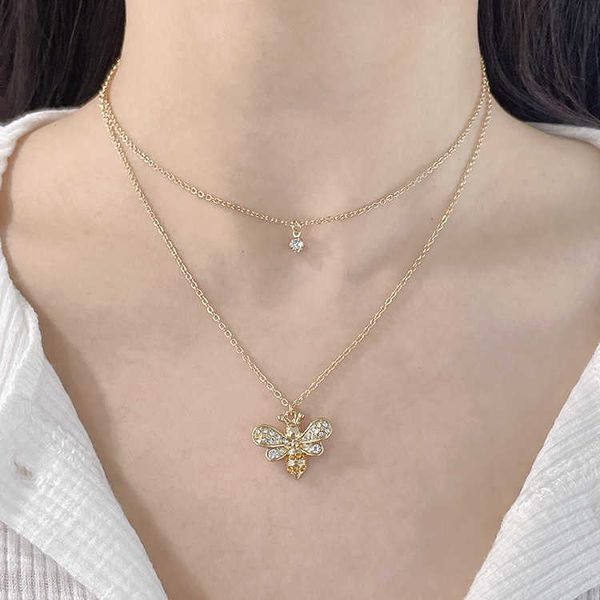 Temperament light luxury jewelry classic small bee diamond pendant double-layer clavicle chain versatile women's necklace

Elegant light luxury jewelry featuring a classic small bee diamond pendant...