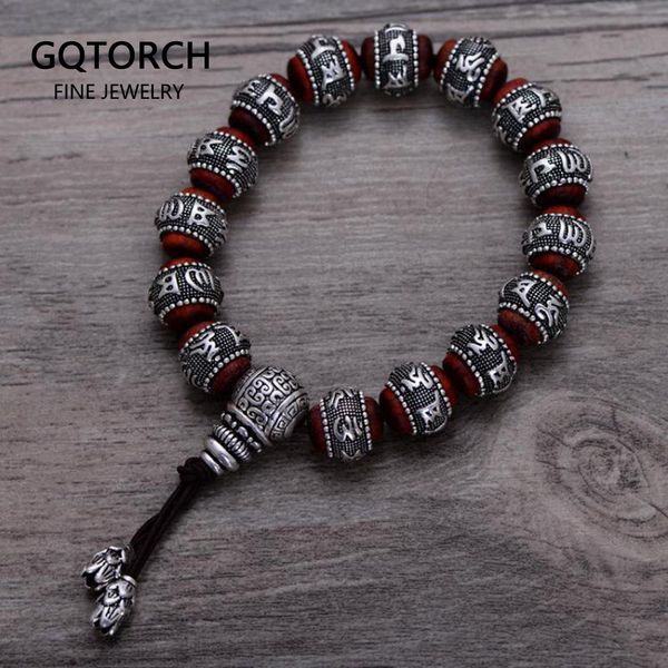 Tibetan Om Mani Padme Hum bracelet crafted from natural lobular red sandalwood with 925 sterling silver Buddha mantra inlay, designed for both men and women