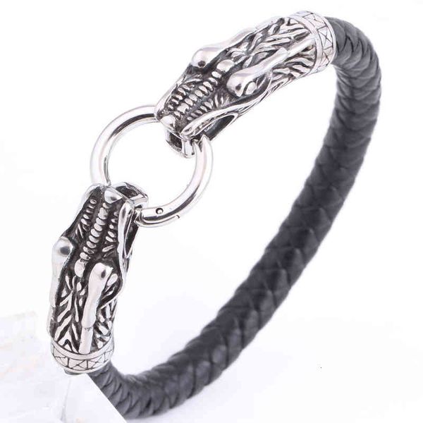 Titanium steel bracelets featuring a double faucet design with two-layer leather and dragon stainless steel casting