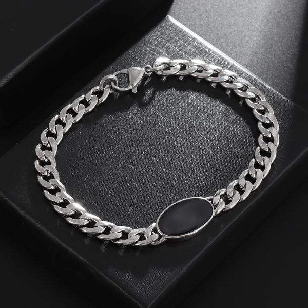 Trendy Cuban chain bracelet with black oval zircon inlays, crafted in 14K white gold for stylish men and women, perfect as a cool street or party accessory and a great jewelry gift