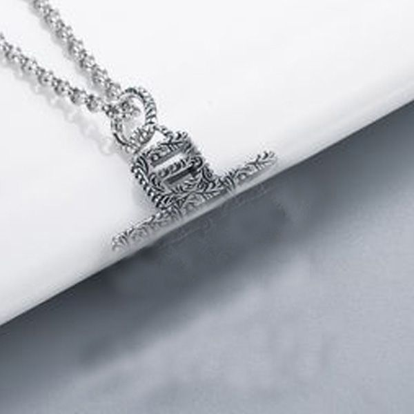 Trendy S925 sterling silver retro hollow cross pendant necklace for couples, featuring hip-hop style stitching design