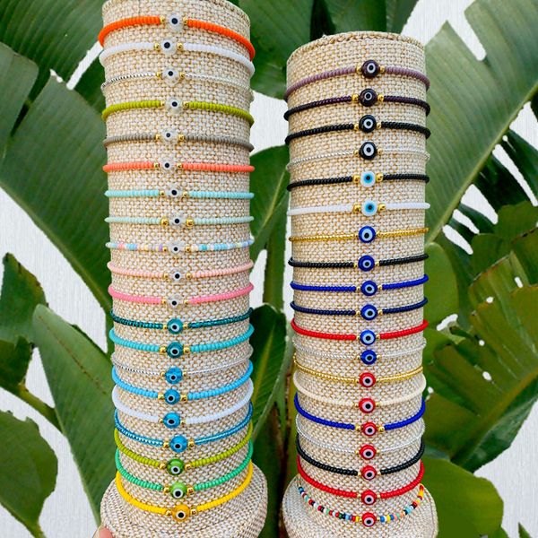 Turkish Eye Bracelet in white and blue featuring evil eye charms, colorful crystal beads, and a woven rope chain, designed as lucky couple bracelets for women