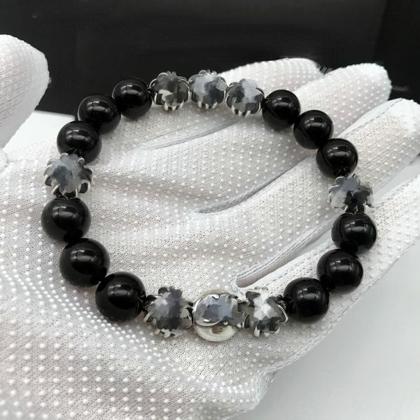 Unisex beaded natural obsidian bracelet with eight silver beads, featuring a stylish cross design in retro Thai silver, popular in Europe and the US