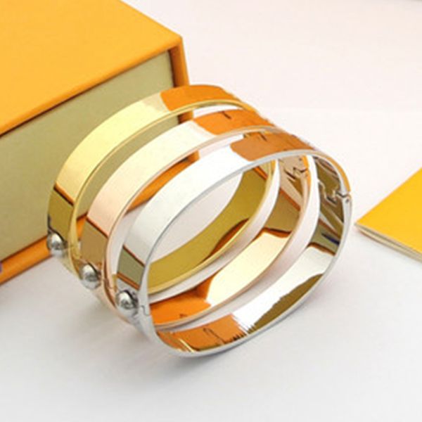 Unisex diamond-engraved gold-plated stainless steel cuff bracelets for men and women, perfect for engagements and parties, presented in an elegant gift box