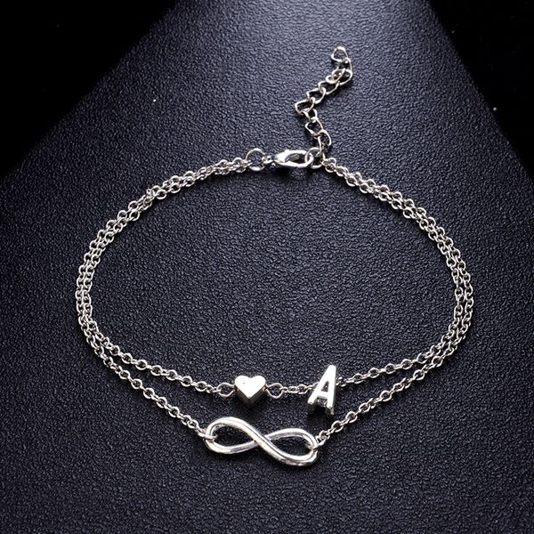 Vintage 26-letter anklet bracelets featuring initial, heart, and infinity charms - bohemian-style friendship jewelry for women and girls