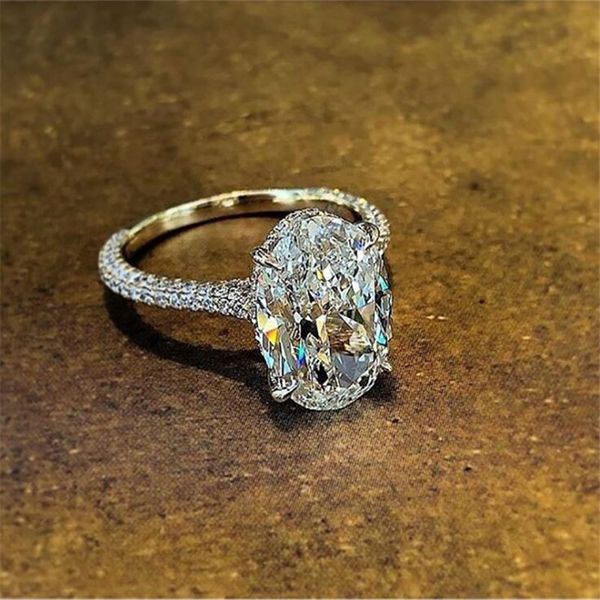 Vintage oval-cut 4ct lab diamond promise ring in 925 sterling silver, perfect for women's engagement or wedding bands