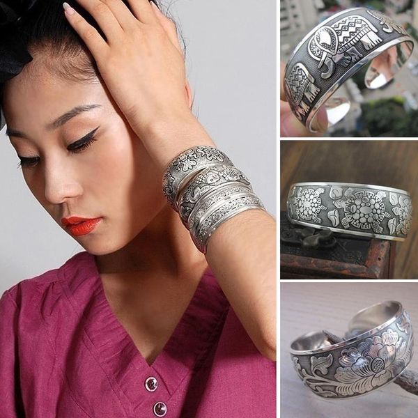 Vintage wide bangles with ethnic carvings of elephants, tortoises, and flowers in antique silver plating for men and women