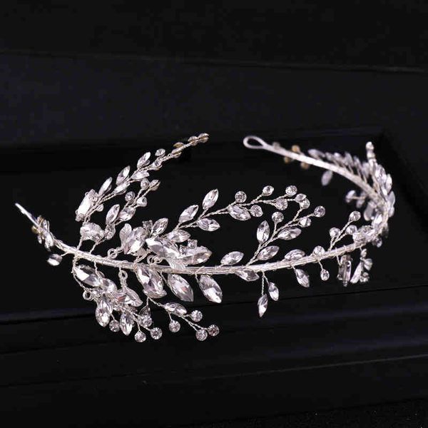 Wedding hair accessories featuring handmade crystal headbands by Tuan Ming, available in bulk for bridal use