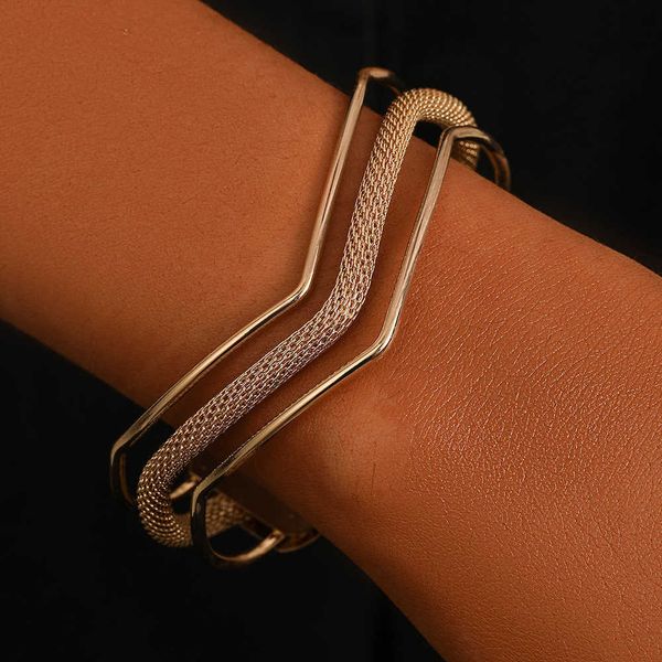 Wolf Tide's stylish 3-layer hollow V-shaped bangle for women features an adjustable open cuff design in trendy gold-tone metal