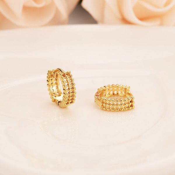 Women's 18K yellow gold round hoop and huggie earrings for girls, boys, and kids