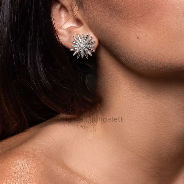 Women's elegant gold-plated brass jewelry set featuring sunflower-inspired cubic zirconia stud earrings and a matching luxury ring necklace