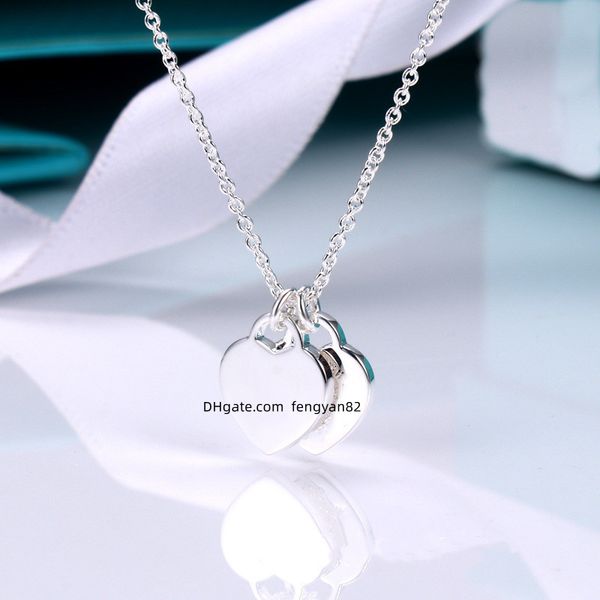 Women's gold double heart necklace, perfect Valentine's or Mother's Day gift, elegant designer pendant jewelry in a box